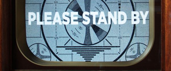 Please Stand By