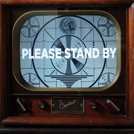 Please Stand By